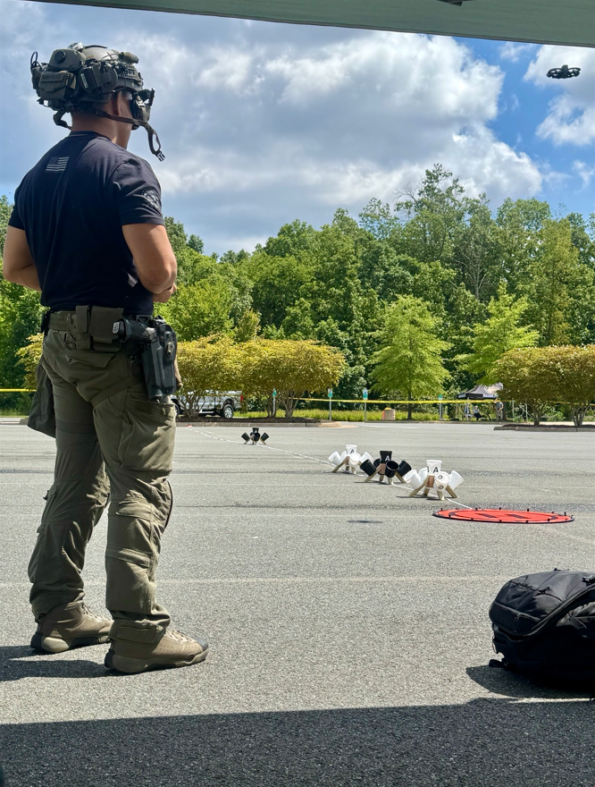 A police officer flies a UAS